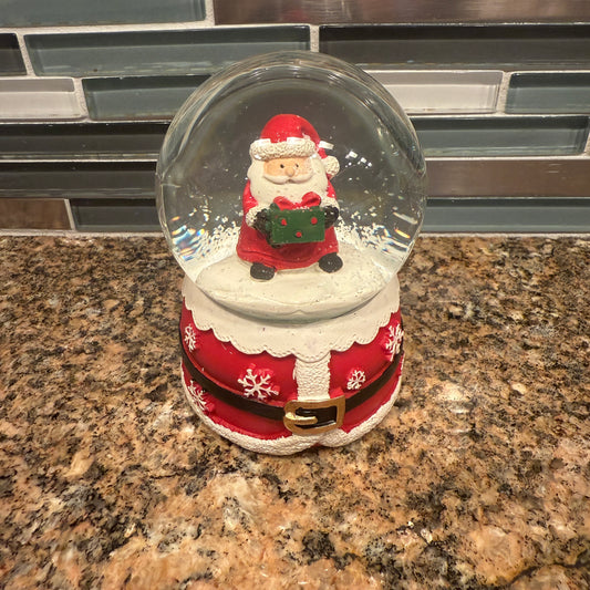 Santa Clause with snowflakes Snow globe